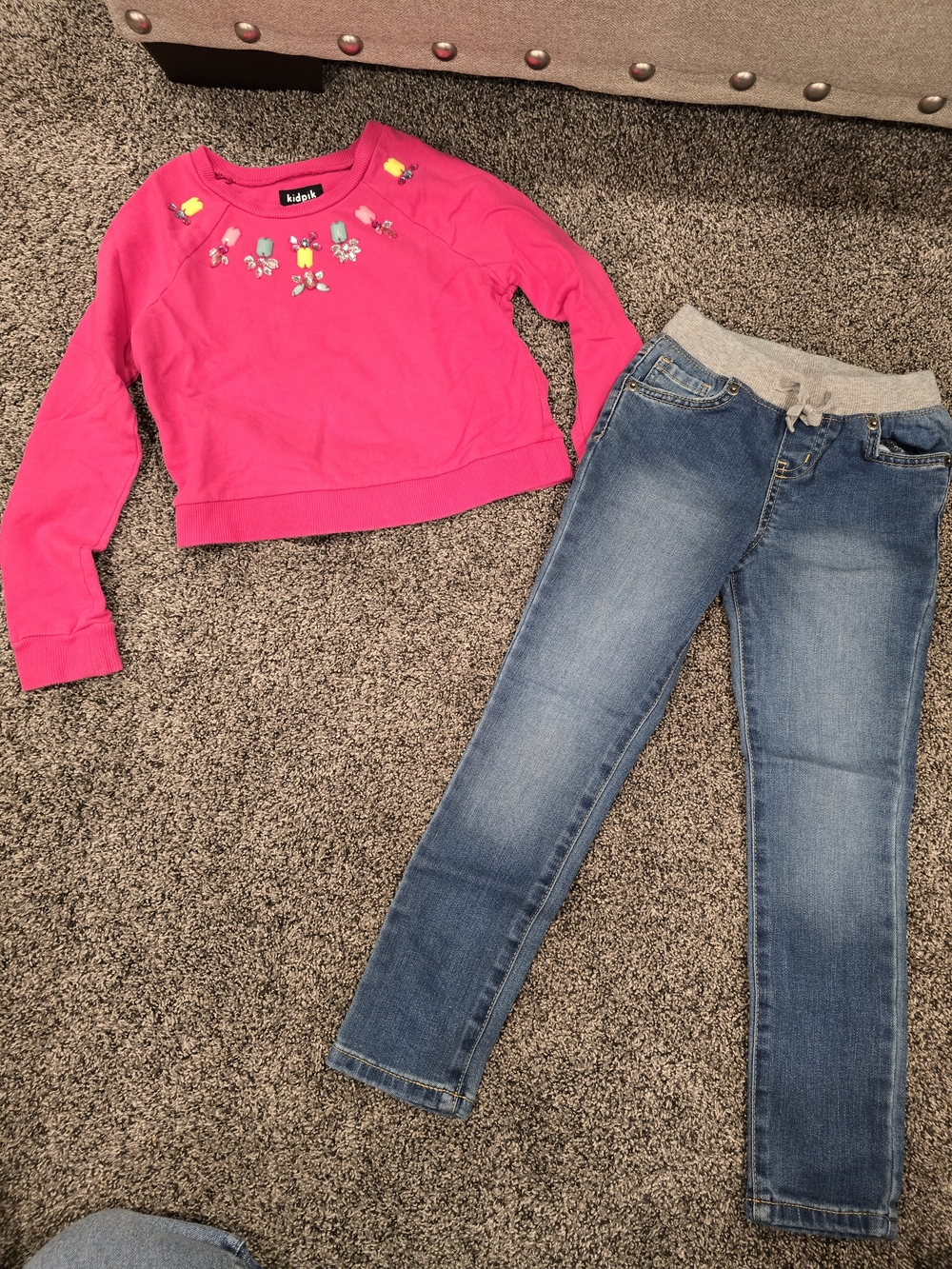 Kids Bright Pink Sweatshirt With Gem Design Around Neckline and Jeans